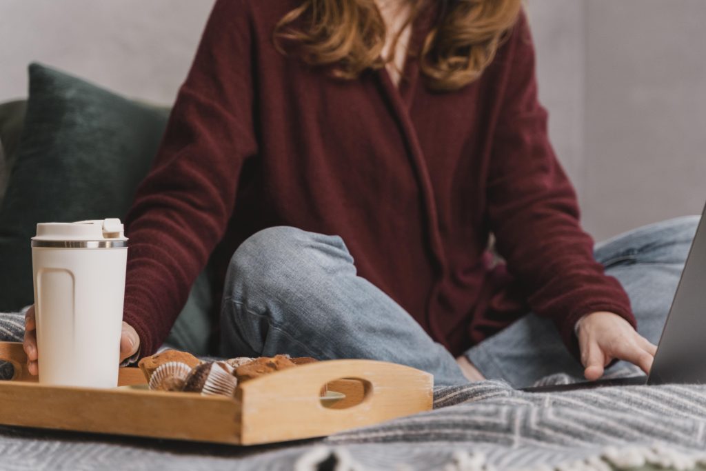 Close Up Woman With Breakfast Bed